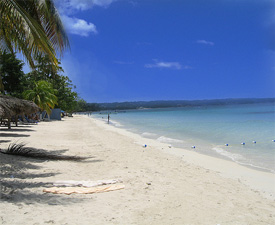 Picture of beach in Jamaica.  The image is linked to a website with current weather and local time.